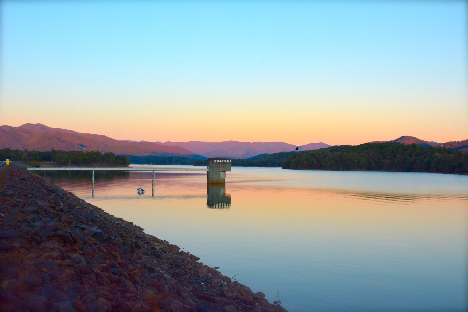Lake Chatuge reservoir and mountain ridges at sunset