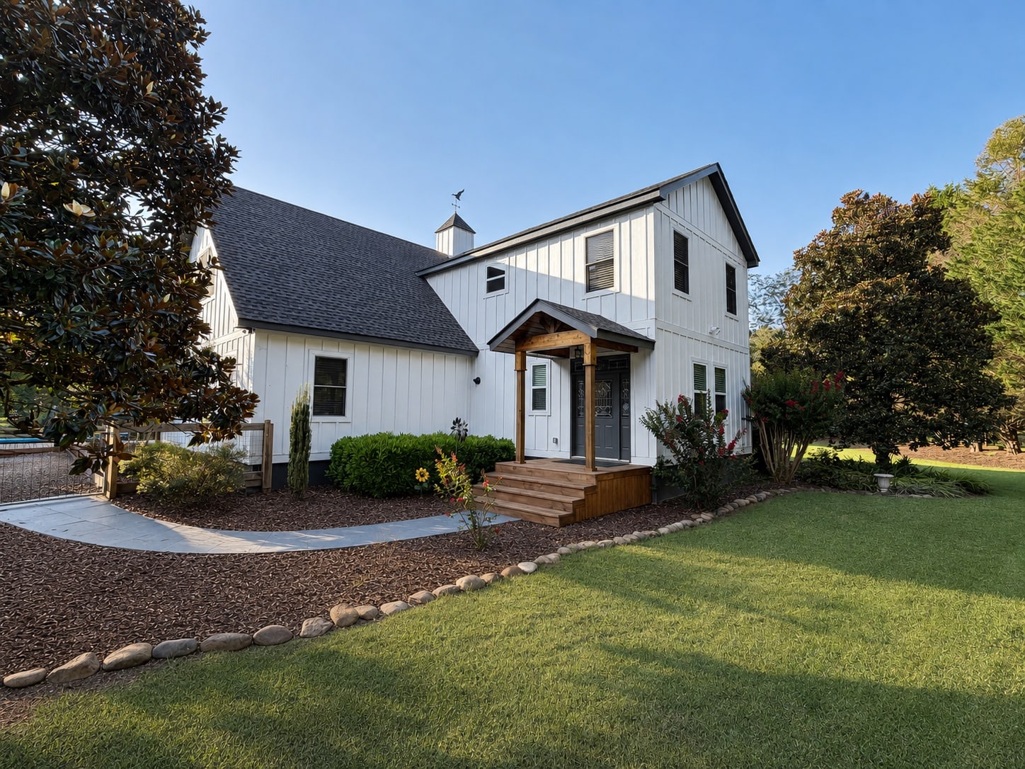 Front entrance and side elevation with established landscaping