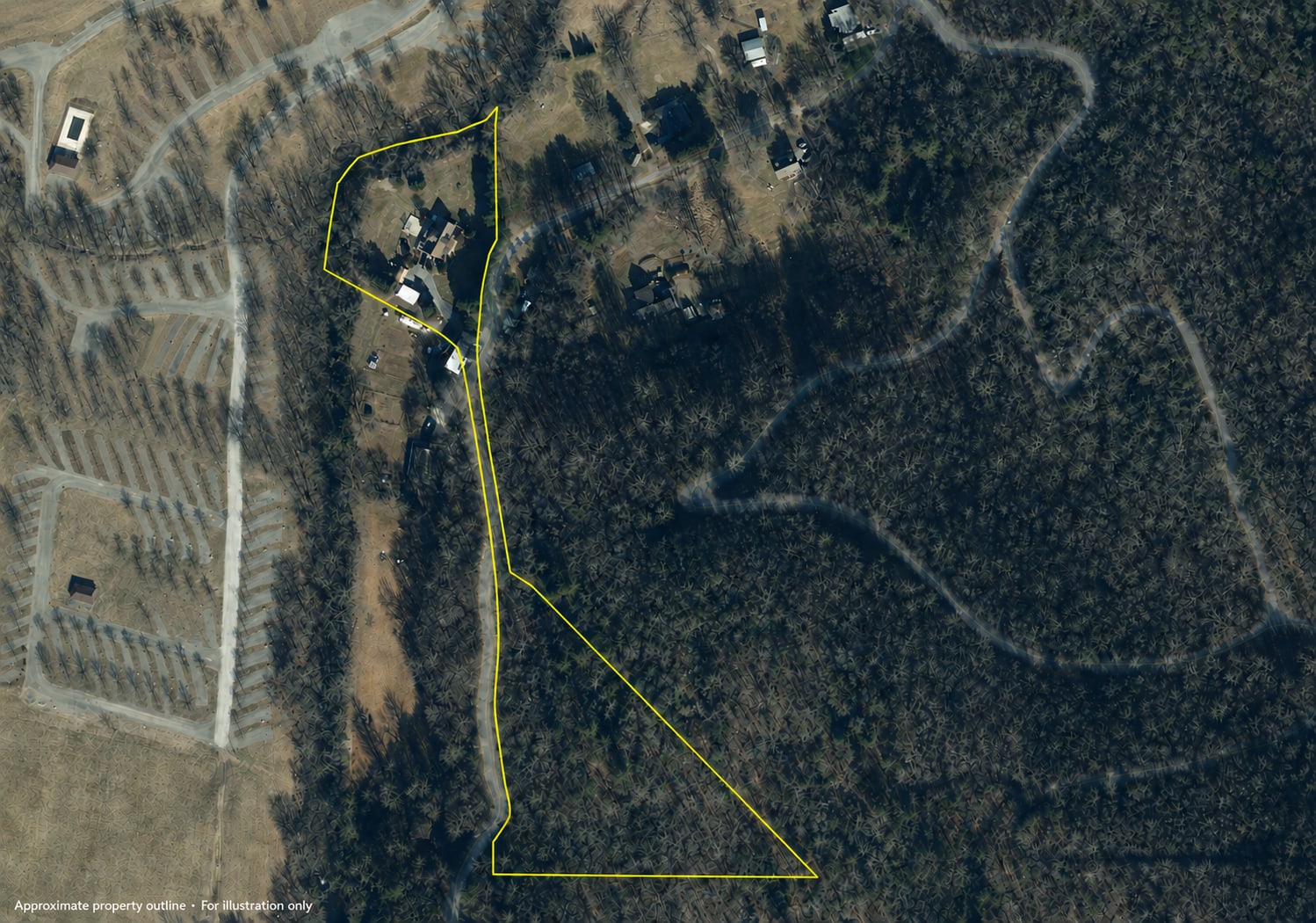 Top-down aerial image with an approximate outline of the connected property parcels in yellow